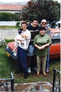 Photograph - Benjie, Stephen, Robert, Yvonne and Martin Brandt with "The Red Flash" in the background.